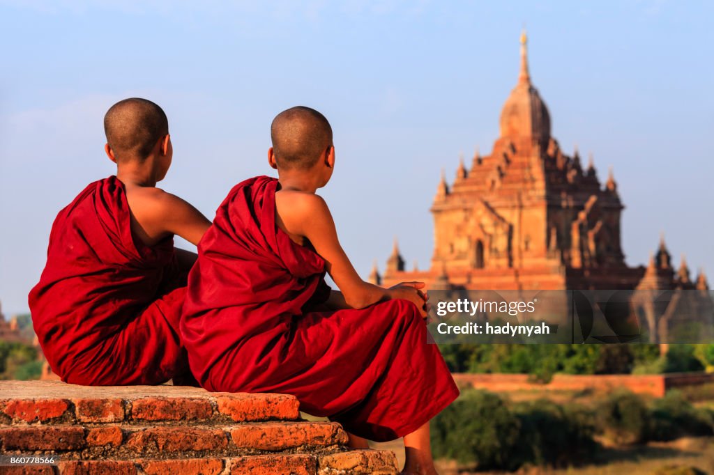 Young Buddhist monks resting on the temple, Myanmar