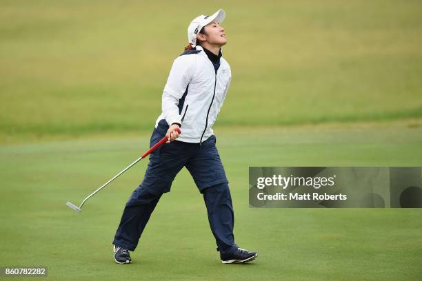 Sarina Kobayashi of Japan reacts after her putt on the 2nd green during the first round of the Fujitsu Ladies 2017 at the Tokyu Seven Hundred Club on...