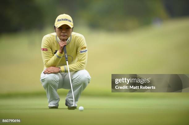 Saiki Fujita of Japan waits to putt on the first green during the first round of the Fujitsu Ladies 2017 at the Tokyu Seven Hundred Club on October...