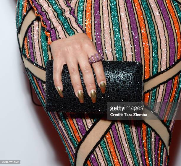 Pia Toscano, purse detail, at The Imagine Ball at The Peppermint Club on October 12, 2017 in Los Angeles, California.