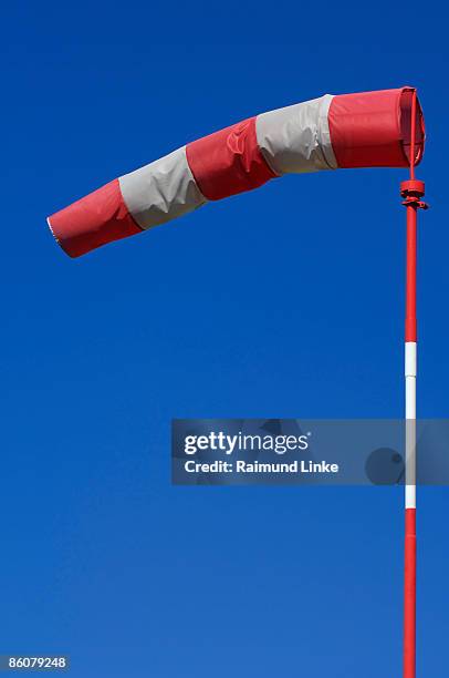 windsock in blue sky - windsock stock pictures, royalty-free photos & images