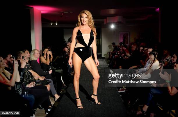 Gia Marie walks the runway for Yandy's Annual Halloween Fashion Show at Playboy World Headquarters on October 12, 2017 in Beverly Hills, California.