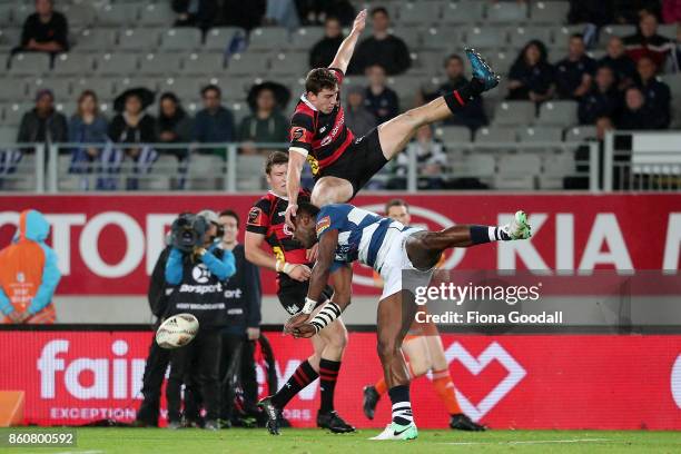 Joe Ravouvou of Auckland goes for the high ball with Josh McKay of Canterbury during the round nine Mitre 10 Cup match between Auckland and...