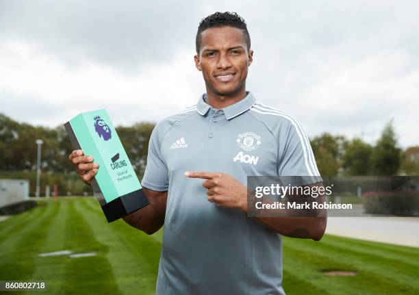 Antonio Valencia of Manchester United poses with the Carling Goal of the Month Award for September 2017 on October 12, 2017 in Manchester, England.