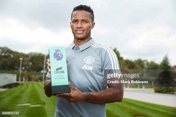 Antonio Valencia of Manchester United poses with the Carling Goal of the Month Award for September 2017 on October 12, 2017 in Manchester, England.