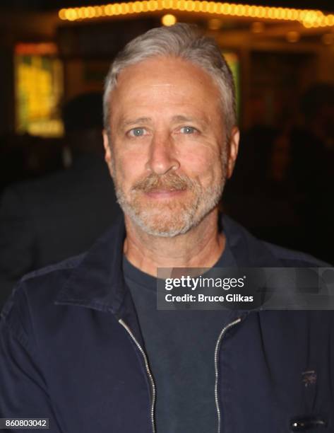 Jon Stewart poses at the opening night arrivals for "Springsteen on Broadway" at The Walter Kerr Theatre on October 12, 2017 in New York City.