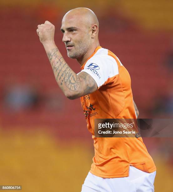 Massimo Maccarone of Brisbane celebrates his goal during the round two A-League match between the Brisbane Roar and Adelaide United at Suncorp...