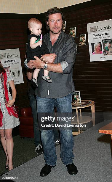 Actor Dean McDermott and daughter Stella Doreen McDermott attend a signing for Tori Spelling's book "Mommywood" at Barnes & Noble Booksellers at The...