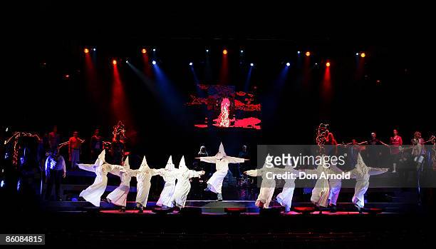 Ensemble cast play dancing klansmen during the 'Jerry Springer The Opera' photo call at the Sydney Opera House on April 21, 2009 in Sydney, Australia.