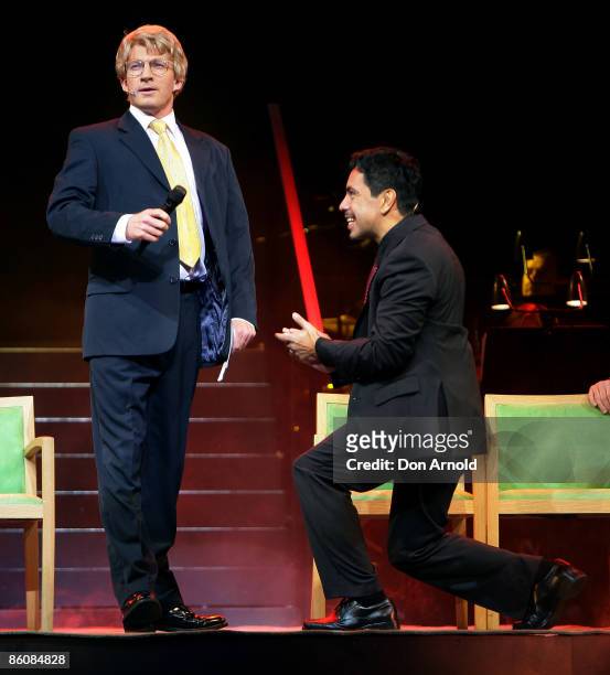 David Wenham plays the role of Jerry Springer and David Bedalla plays the role of Prince of Darkness during the 'Jerry Springer The Opera' photo call...