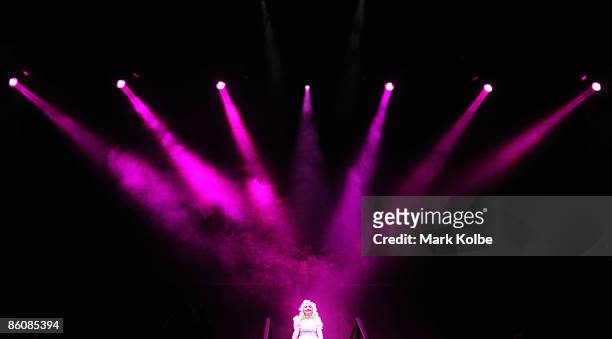 Performer Kate Miller Heidke who plays Baby Jane sings during the "Jerry Springer: The Opera" photocall at the Sydney Opera House in Sydney,...