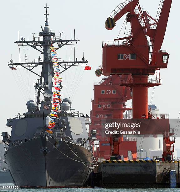 Navy missile destroyer USS Fitzgerald docks at Qingdao Port to attend an international fleet review to be held on April 23 to celebrate the 60th...