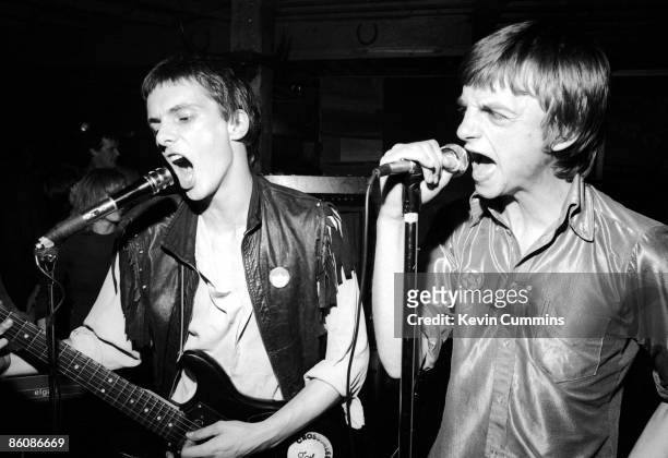 Martin Bramah and Mark E. Smith performing with English rock group The Fall at The Ranch, Manchester's first punk club, 18th August 1977.