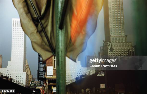 Buildings on Third Avenue, New York reflected in a shop window, 1952.