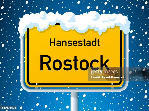 rostock german city road sign winter snow - rostock stock illustrations
