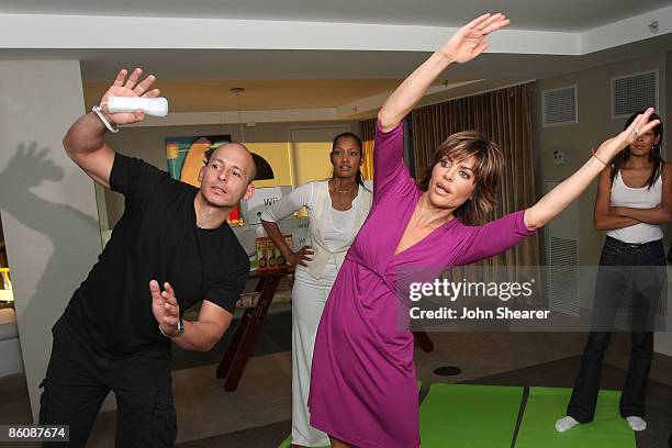 Trainer Harley Pasternak and actress Lisa Renna tries out the Wii during the Wii Fit Moms event hosted by Garcelle Beauvais Nilon and Harley Pastern...