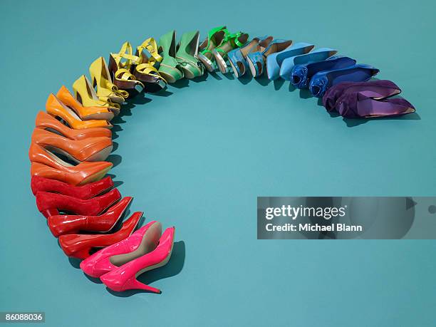 shoes in rainbow formation - obsessive stockfoto's en -beelden