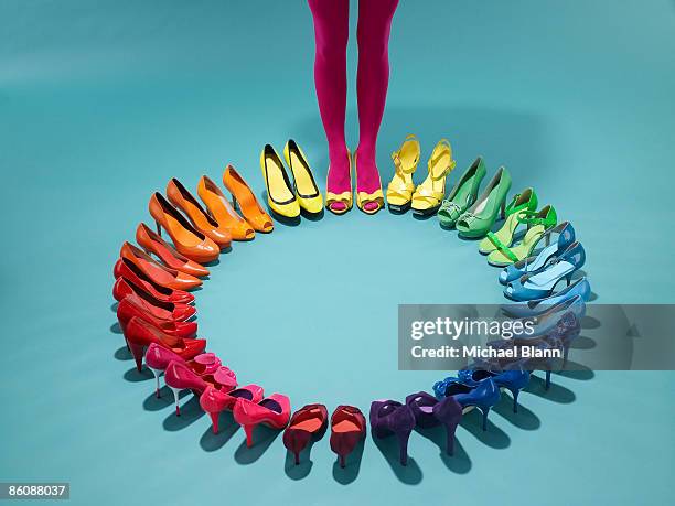 colorful shoes form a color wheel with legs - blaue schuhe stock-fotos und bilder