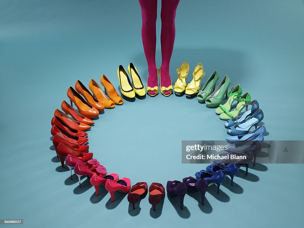 Colorful shoes form a color wheel with legs