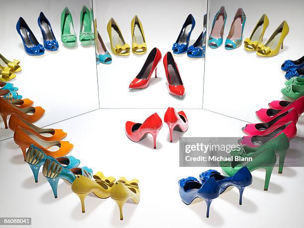 colorful shoes reflected in mirror - abundance stock pictures, royalty-free photos & images
