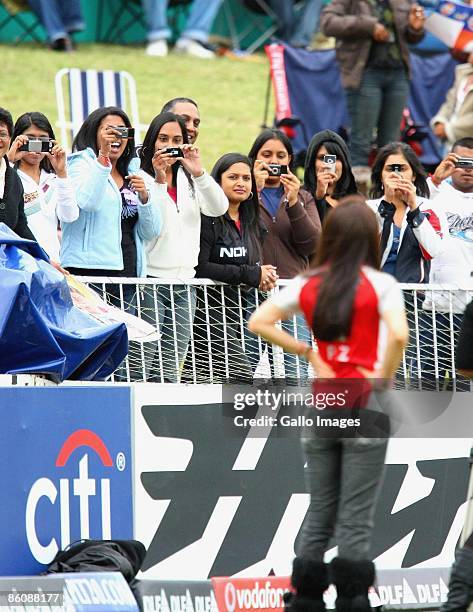 Fans take photos of Bollywood Star Preity Zinta during the IPL T20 match between Kings XI Punjab v Kolkata Knight Riders at Sahara Park on April 21,...