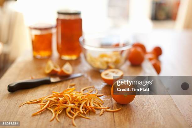 making marmalade in a domestic kitchen. - marmellata di agrumi foto e immagini stock