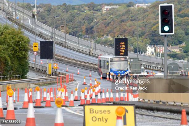 Bus exits the old Forth Road Bridge as a phased re-opening to some scheduled bus services begins, on October 13, 2017 in South Queensferry, Scotland....