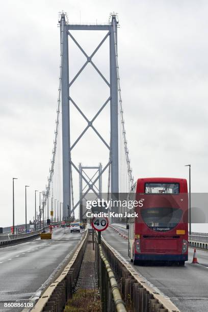 Bus crosses the old Forth Road Bridge as a phased re-opening to some scheduled bus services begins, on October 13, 2017 in South Queensferry,...