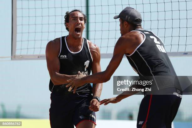 Krou Youssef and Aye Quincy of France celebrate during the match against Sandlie Sorum Christian and Mathias Berntsen of Norway on Day 3 of 2017 FIVB...