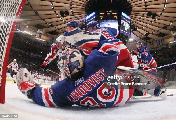 Henrik Lundqvist of the New York Rangers blocks the net against the Washington Capitals during Game Three of the Eastern Conference Quarterfinal...