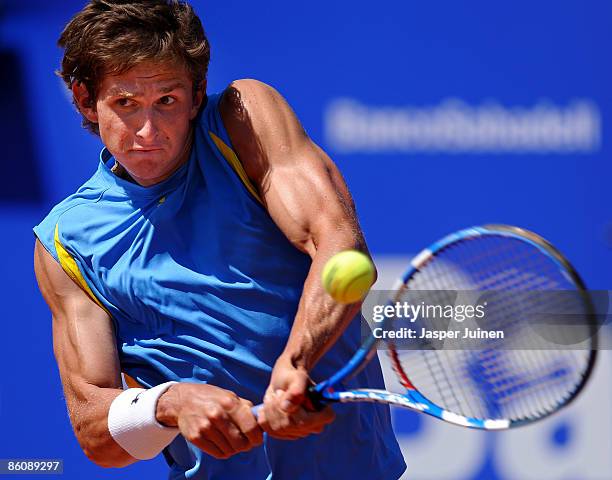 Igor Andreev of Russia returns the ball to Alberto Martin of Spain on day two of the ATP 500 World Tour Barcelona Open Banco Sabadell 2009 tennis...