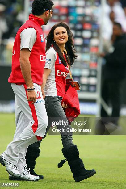 Priety Zinta the owner of the Kings XI walks with Yuvraj Singh during the IPL T20 match between Kings XI Punjab v Kolkata Knight Riders at Sahara...