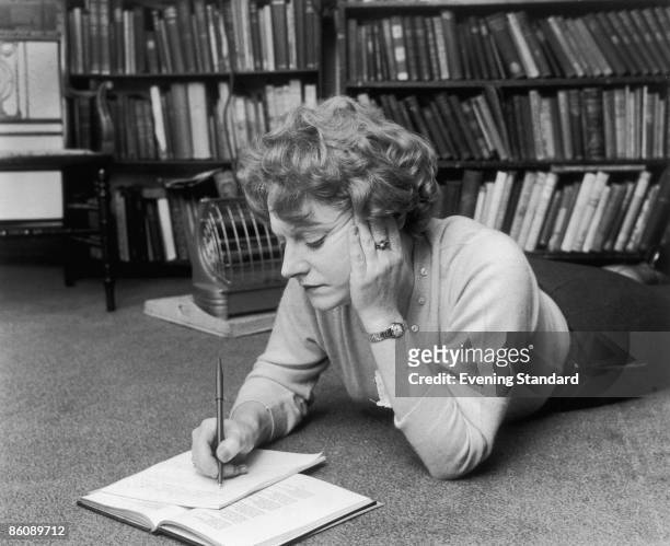 Scottish writer Muriel Spark at work, 25th May 1960.