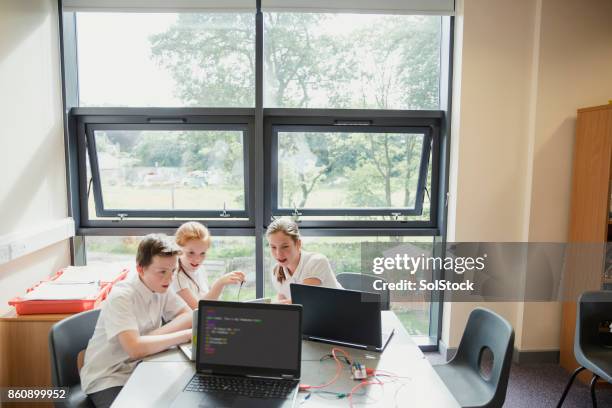 kids coding lesson in high school - html stock pictures, royalty-free photos & images