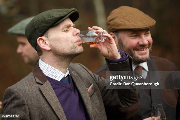 whiskey tasting session at a clay pigeon shoot - whiskey tasting stock pictures, royalty-free photos & images