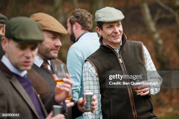 whiskey tasting session at a clay pigeon shoot - whiskey tasting stock pictures, royalty-free photos & images