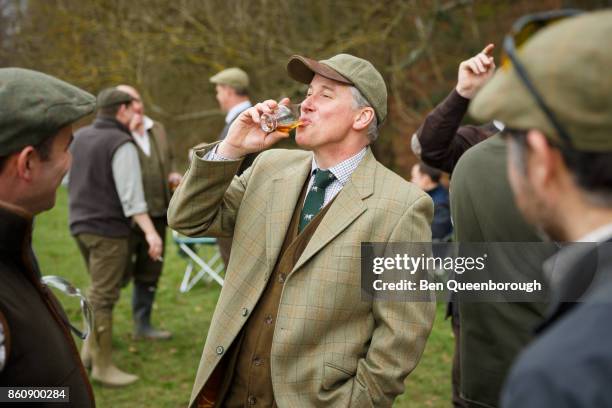 whiskey tasting session at a clay pigeon shoot - whiskey tasting stock pictures, royalty-free photos & images