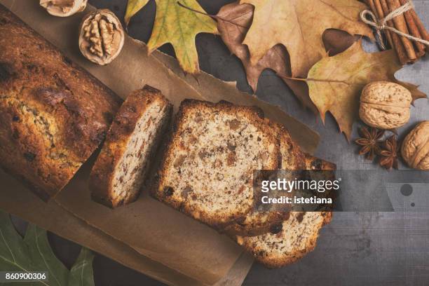 christmas cake with dried fruits and nuts - cake stockfoto's en -beelden