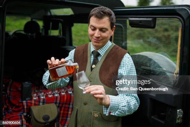 whiskey tasting session at a clay pigeon shoot - whiskey tasting stock pictures, royalty-free photos & images