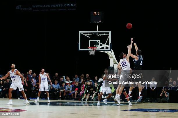 Kirk Penney of the Breakers forces up a three pointer against Dane Pineau of the Kings during the round two NBL match between the New Zealand...