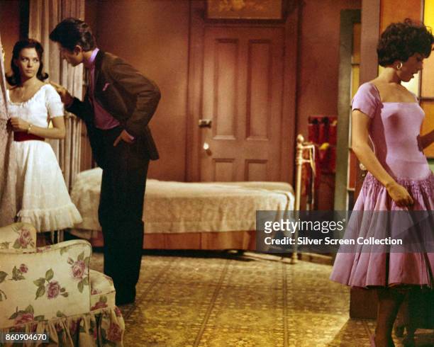 From left, American actors Natalie Wood , George Chakiris , and Puerto Rican-born Rita Moreno in a scene from 'West Side Story' , 1961.