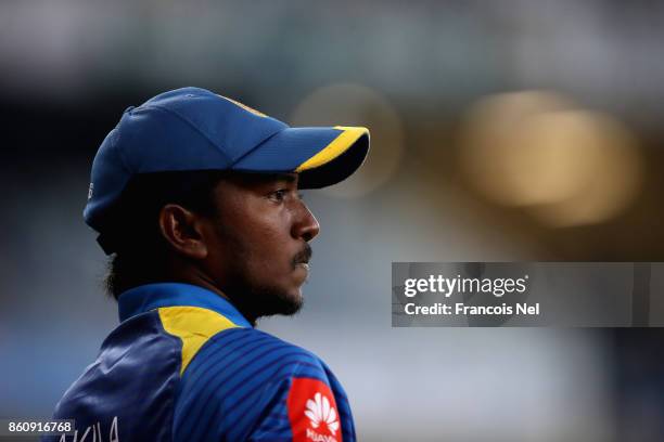 Akila Dananjaya of Sri Lanka looks on during the first One Day International match between Pakistan and Sri Lanka at Dubai International Stadium on...