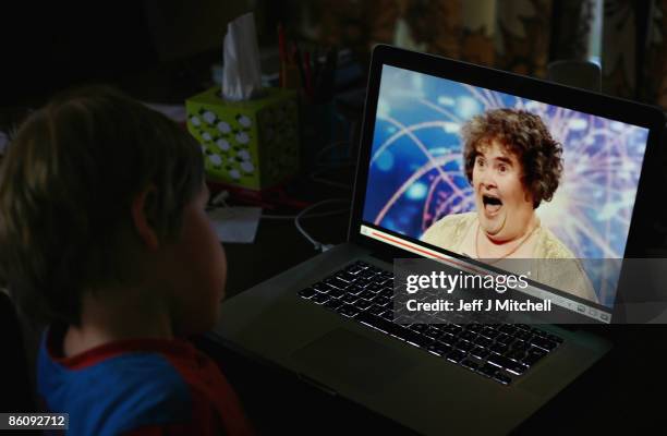 Young boy watches Britain's Got Talent contestant Susan Boyle on You Tube on April 21, 2009 in Glasgow, Scotland. Ms Boyle has become a worldwide...