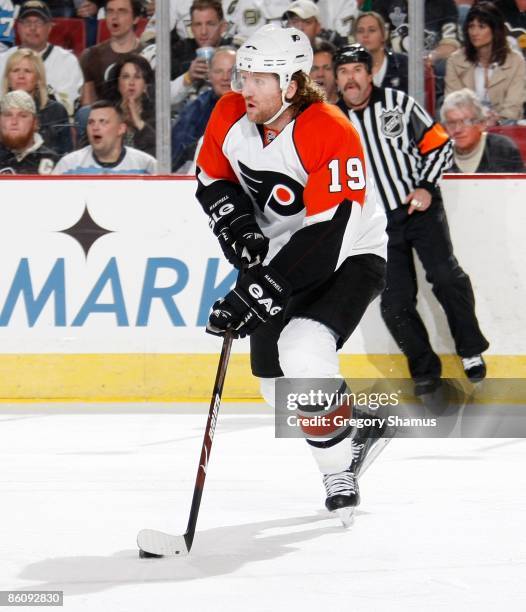 Scott Hartnell of the Philadelphia Flyers looks to pass against the Pittsburgh Penguins during Game Two of the Eastern Conference Quarterfinals of...