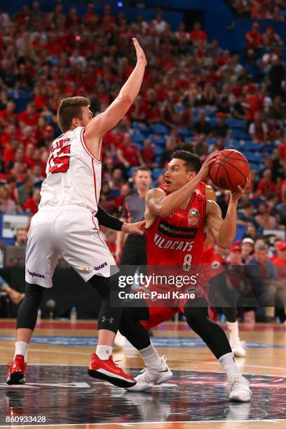 Jarrod Kenny of the Wildcats looks to take on Rotnei Clarke of the Hawks during the round two NBL match between the Perth Wildcats and the Illawarra...