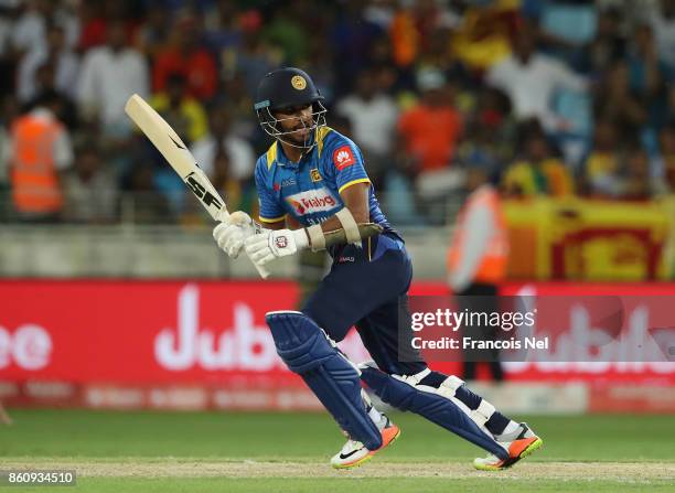 Dinesh Chandimal of Sri Lanka bats during the first One Day International match between Pakistan and Sri Lanka at Dubai International Stadium on...