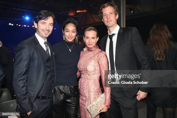 Martin Bachmann and his wife Huong Vu, Nadeshda Brennicke and Florian Stelljes during the 'Tribute To Bambi' gala at Station on October 5, 2017 in...