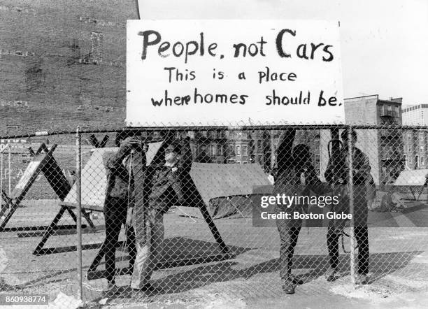 Anti-urban renewal protesters pitch tents and hold signs in a Dartmouth Street parking lot in the South End of Boston, April 28, 1968.