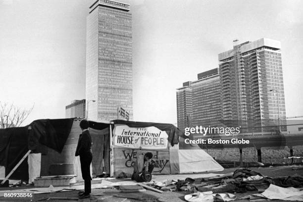 Anti-urban renewal protesters roll up their sleeping bags in a Dartmouth Street parking lot in the South End of Boston, April 28, 1968.