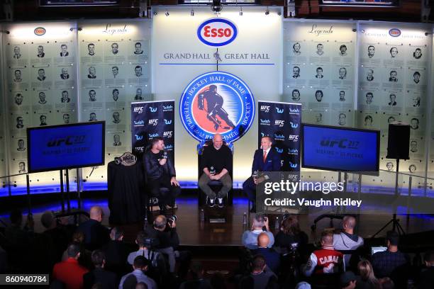 Michael Bisping speaks to the media during the UFC 217 press conference with Dana White and Georges St-Pierre at the Hockey Hall of Fame on October...